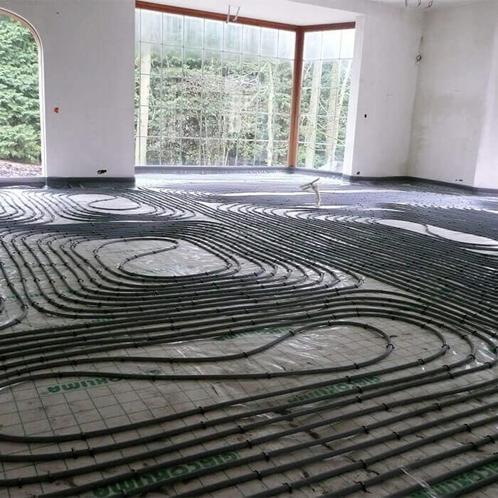 Installation de chauffage par le sol dans une habitation